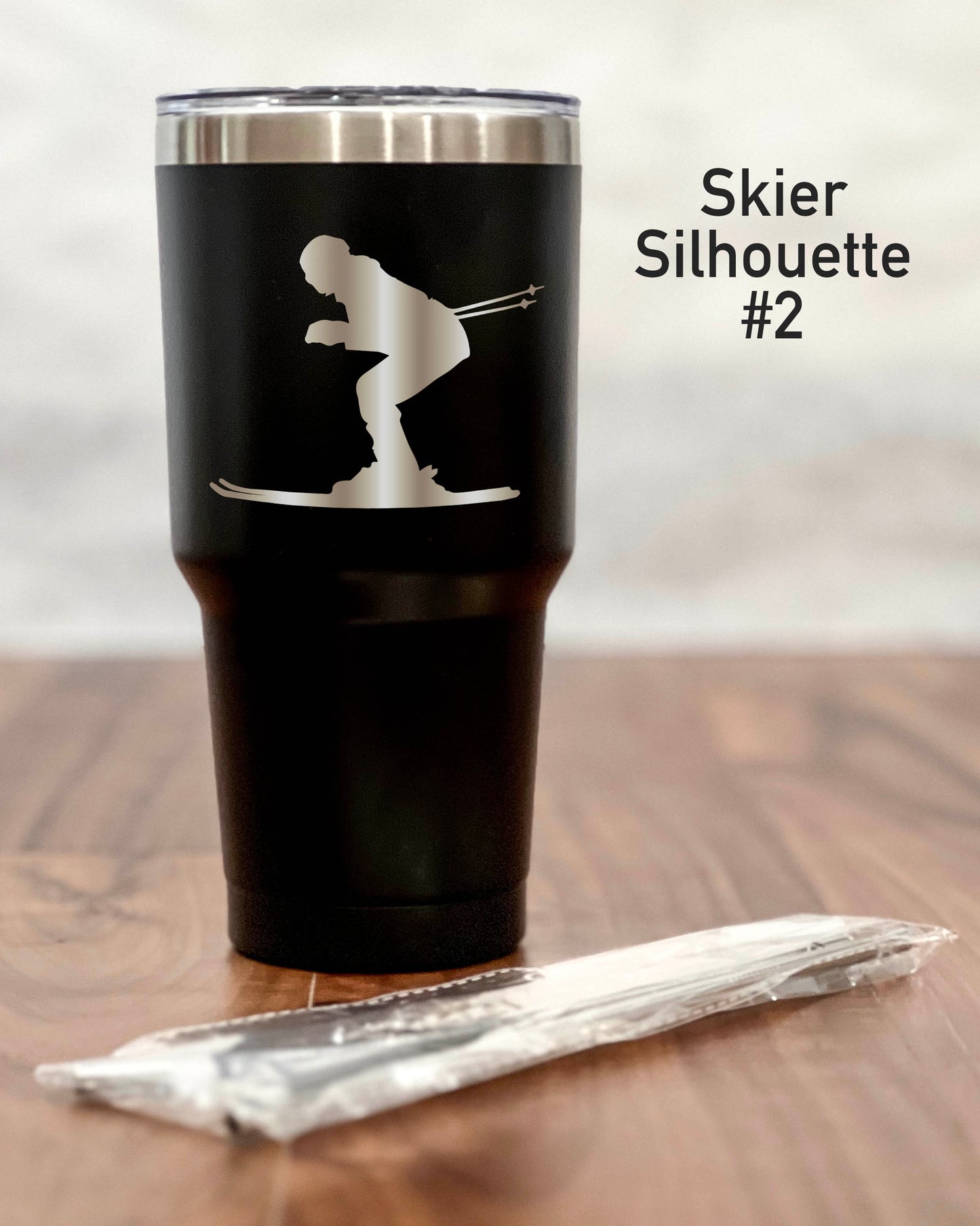 30 ounce Black Tumbler with a Skier or Snowboarder silhouette