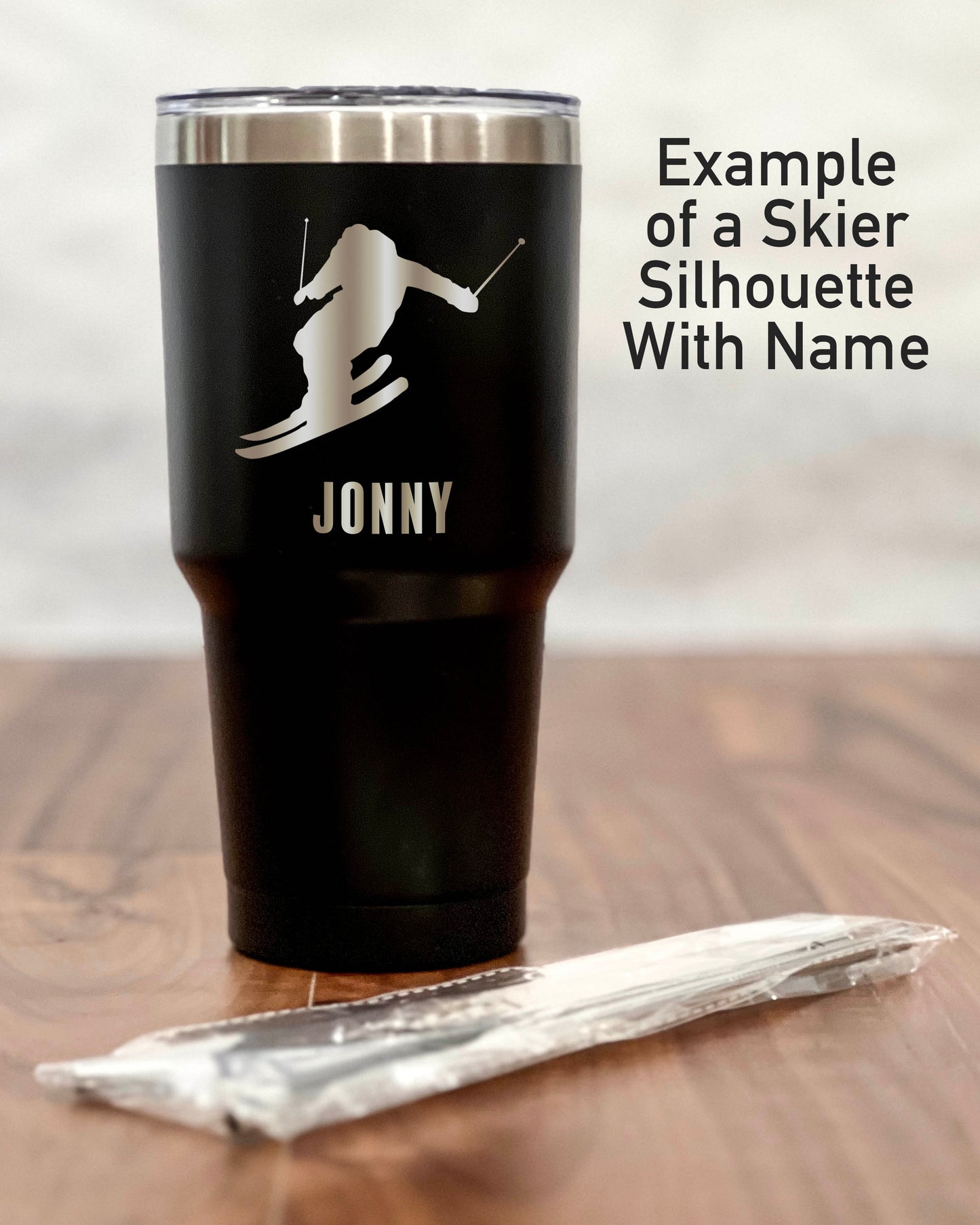 30 ounce Black Tumbler with a Skier or Snowboarder silhouette