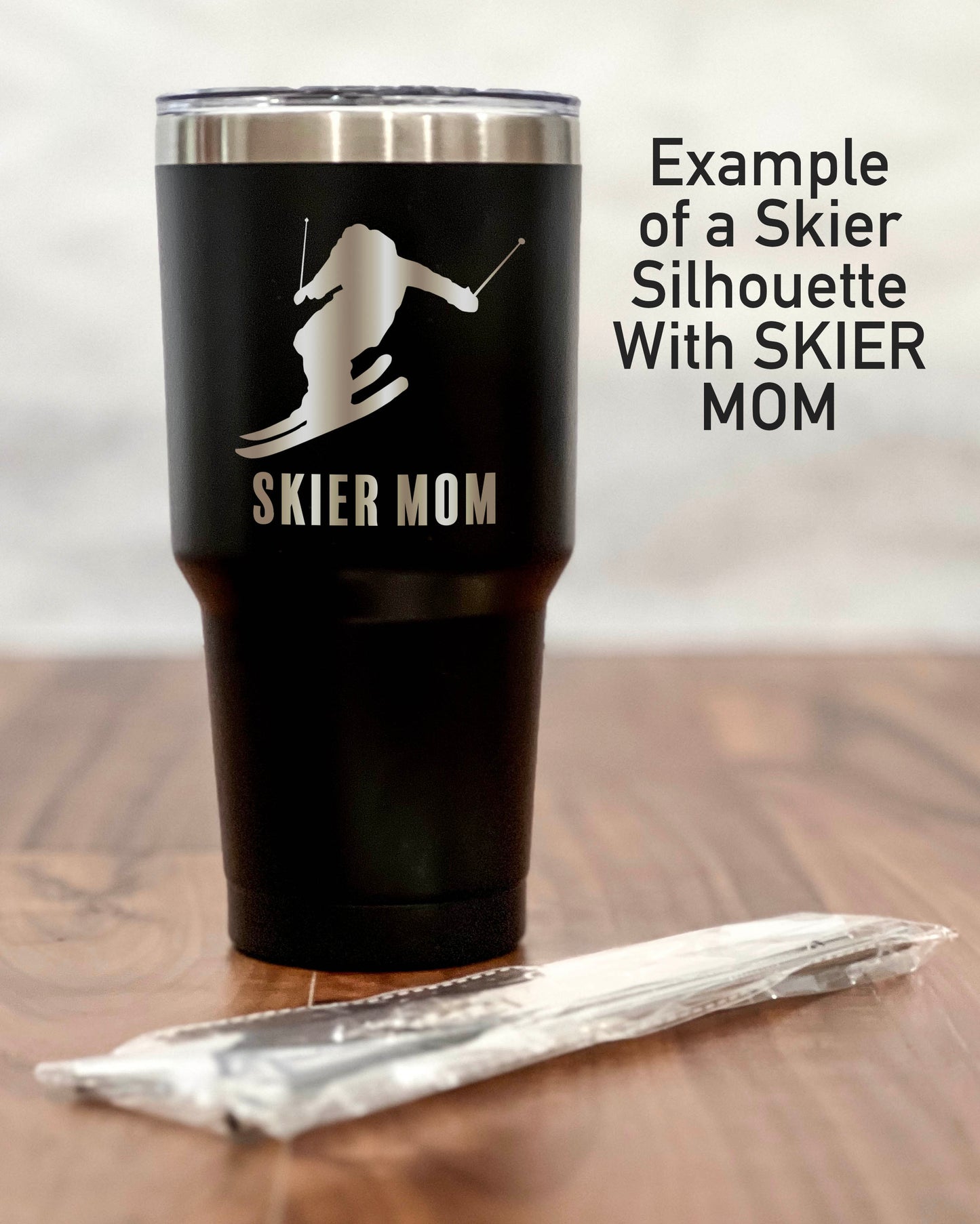 30 ounce Black Tumbler with a Skier or Snowboarder silhouette