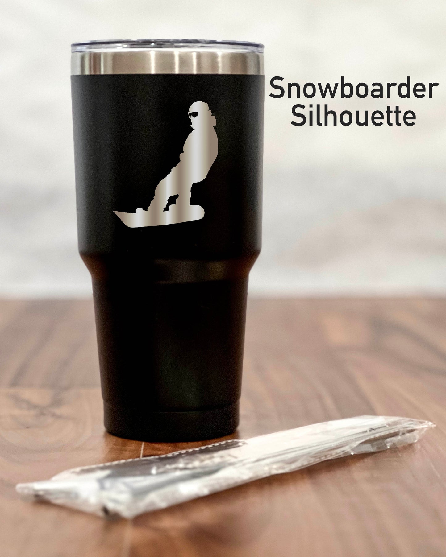 30 ounce Black Tumbler with a Skier or Snowboarder silhouette